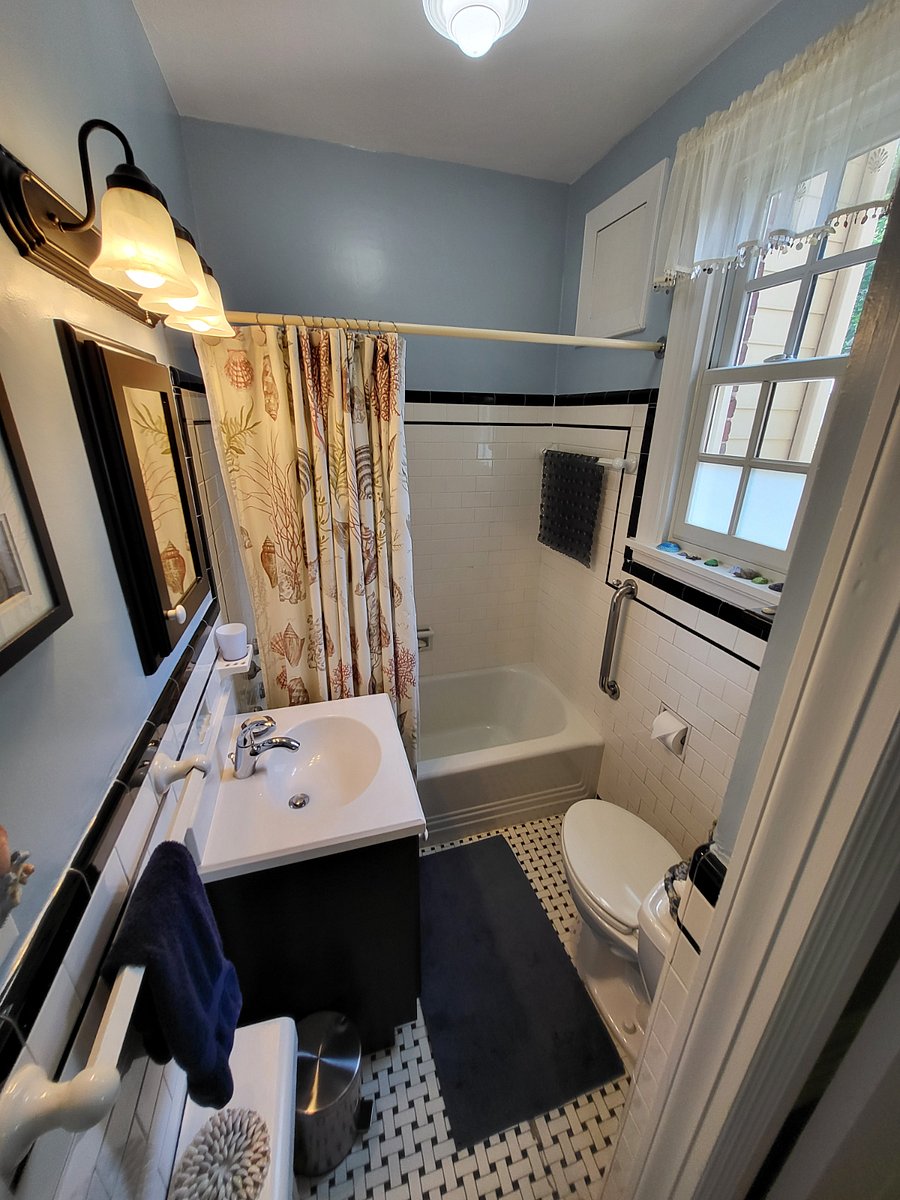 Vanity sink w/cabinet below and medicine cabinet