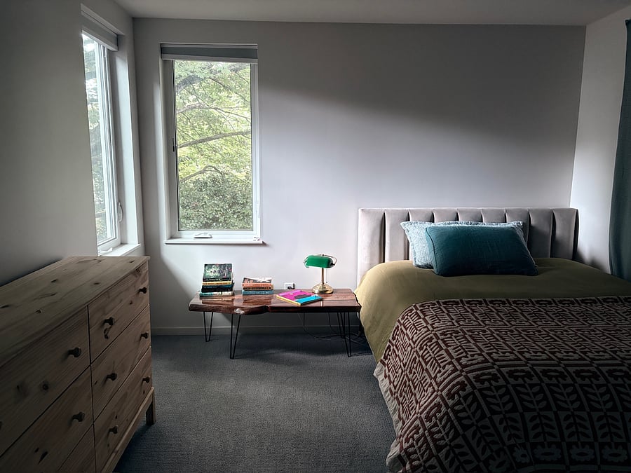 Bedroom on the 2nd floor overlooking the garden. Queen size bed, closet, and dresser. 