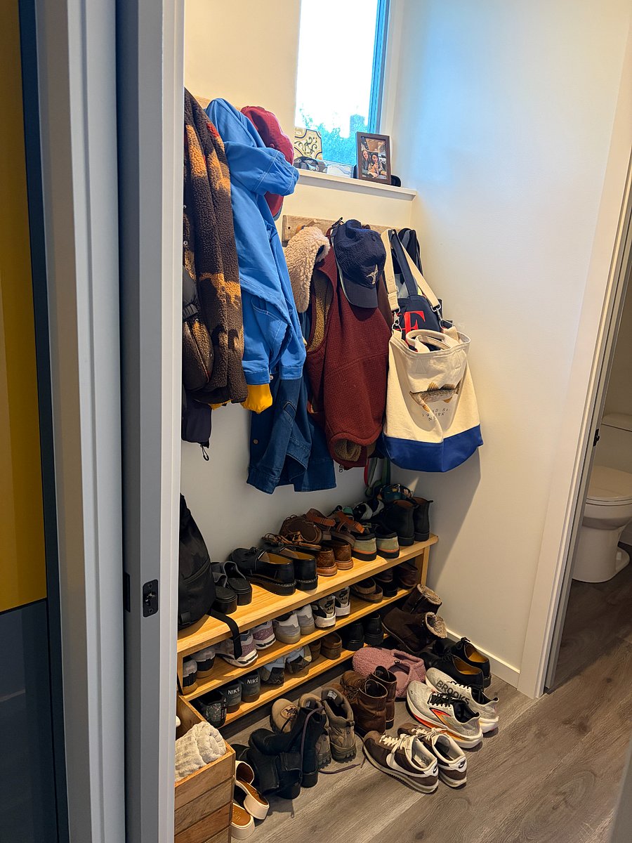 Small mudroom behind the kitchen creates extra storage. The mudroom is attached to a small half bath. All on the ground floor.
