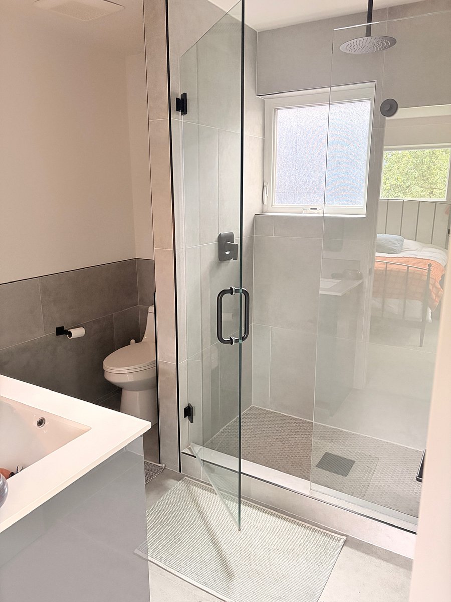 Ensuite bathroom with rain shower and double sinks