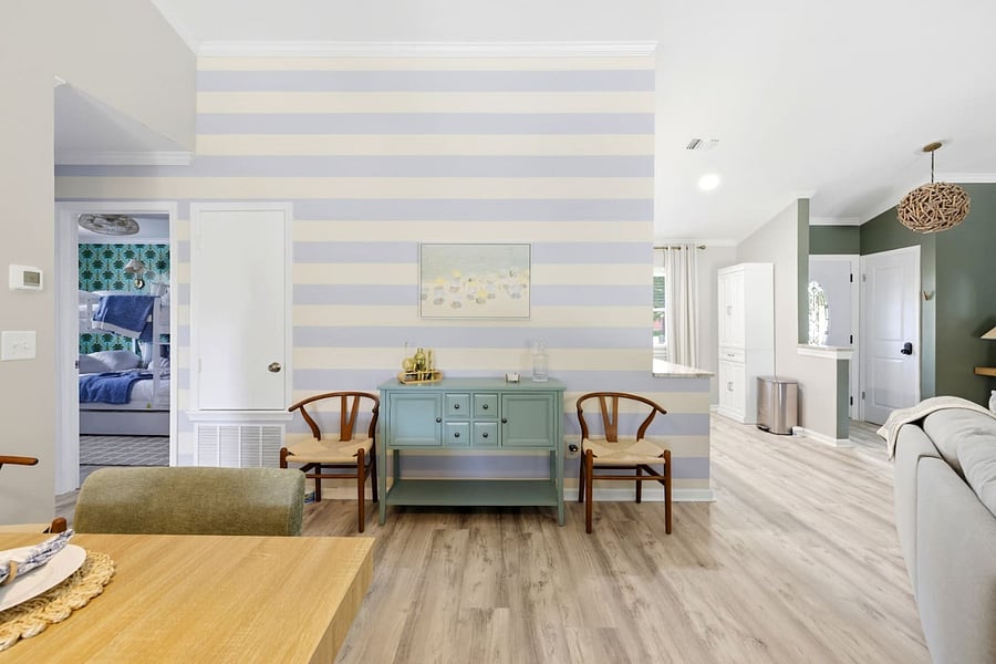 Bright, stylish interior with an airy open layout and charming designer touches.