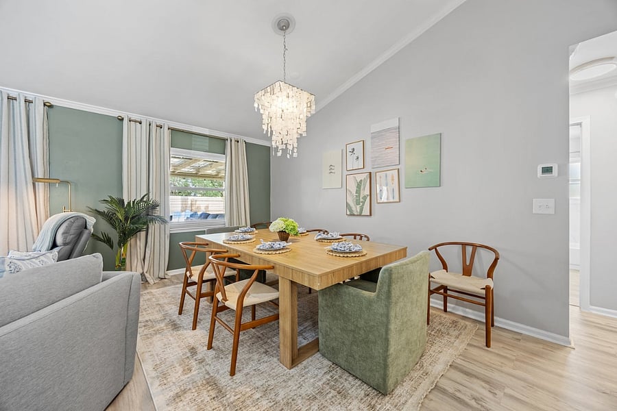The spacious dining area comfortably seats up to 10 guests, making it the perfect place to gather for meals.
