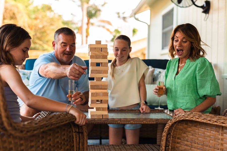 The patio is stocked with favorite lawn games, like Giant Jenga, Cornhole, and Connect Four, all ready for guests to enjoy.
