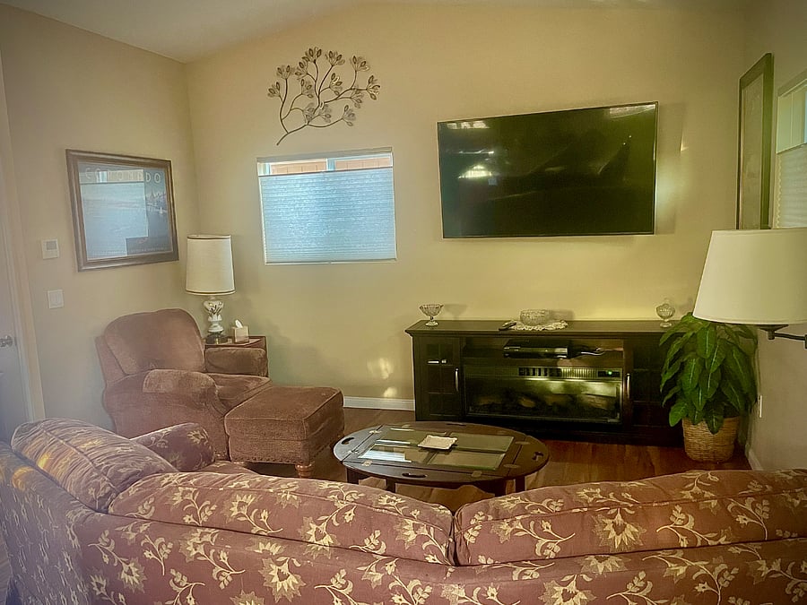 Fireplace and large smart TV, this room was made for comfort.