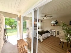 Guest Suite Has its Own Breezeway Entrance, Large Sliders and Plenty of Natural Light!  With Access to Exterior Living Spaces