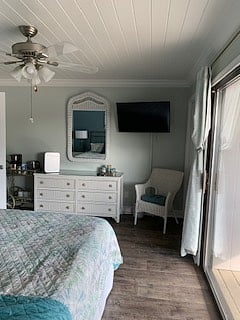 Primary bedroom with TV