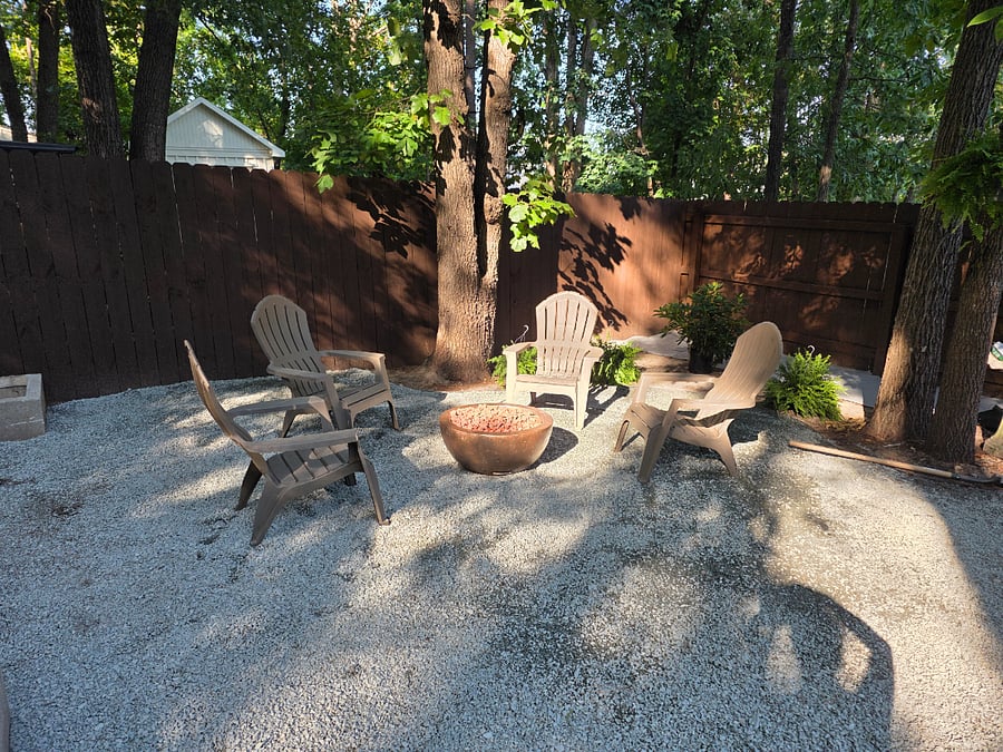 Outdoor Retreat:
Unwind in the private outdoor seating area featuring a cozy fire pit, Adirondack chairs, and charming twinkle lightsthe perfect place to relax under the stars after a day of work or exploring.