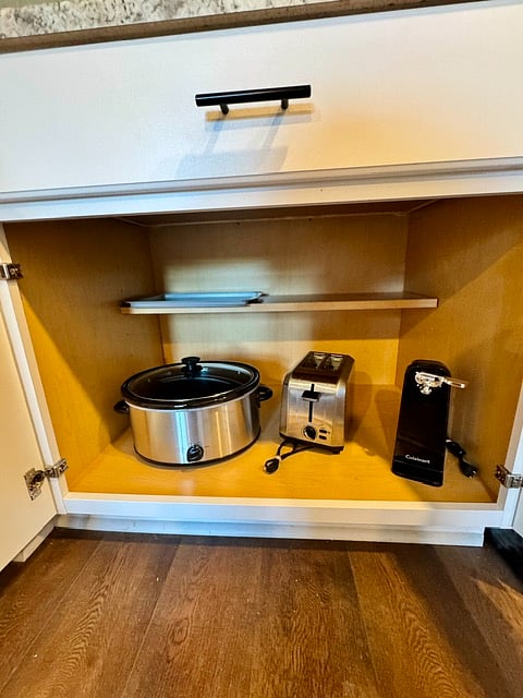 Kitchen Essentials:
The kitchen is stocked with convenient small appliances, including a slow cooker, rice cooker, blender, toaster, and coffee maker, along with cooking essentials to make preparing meals easy and enjoyable.