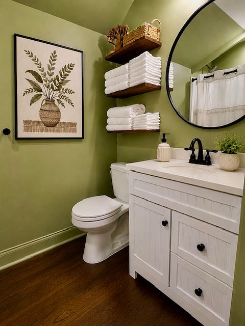 Bathroom:
The bright, clean bathroom features a spacious vanity with storage, a large mirror, fresh towels, and complimentary essentials, providing a comfortable space to get ready each day.