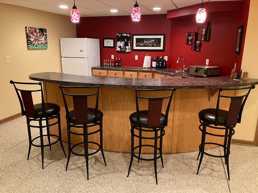 Finished basement bar with 2nd full size fridge