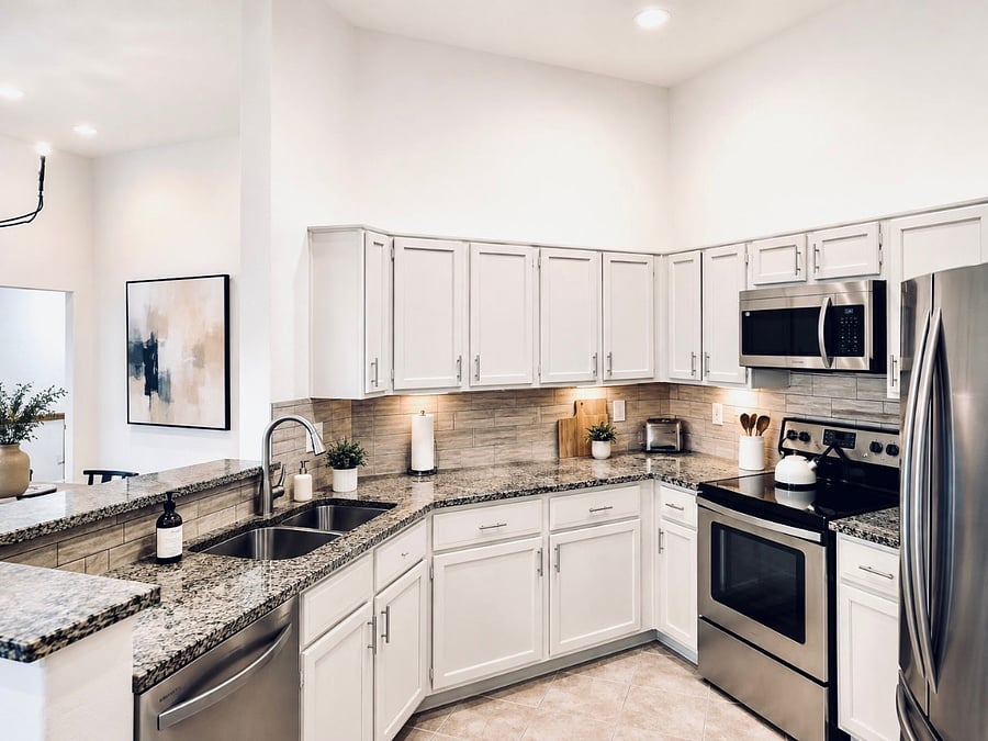 Fully stocked kitchen includes everything you need: Dishware, glassware, utensils, cookware, bakeware, stainless steel appliances, coffee bar, filtered water and ice.