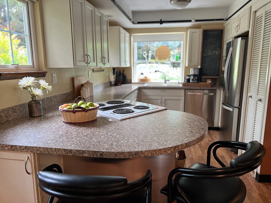 Big kitchen with full size refrigerator, oven, dishwasher, microwave oven, coffee pot and toaster/air-fryer oven. Everything you need.