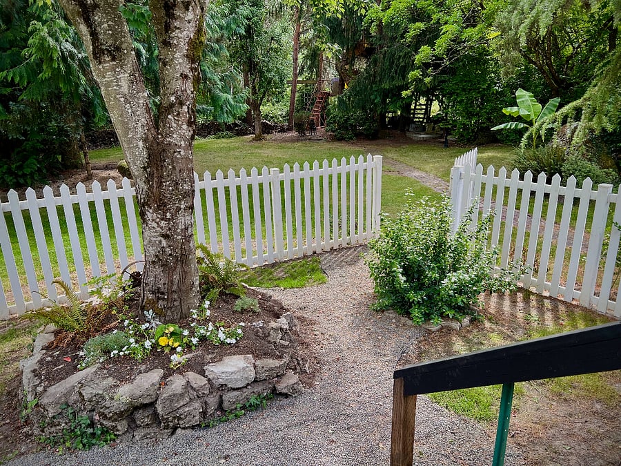 Private yard opens to gated Community Spaces