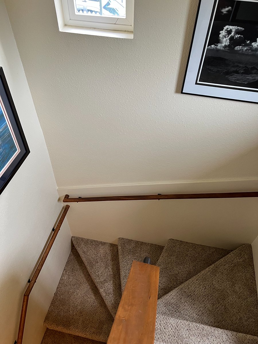 Winder stairs with safety rails