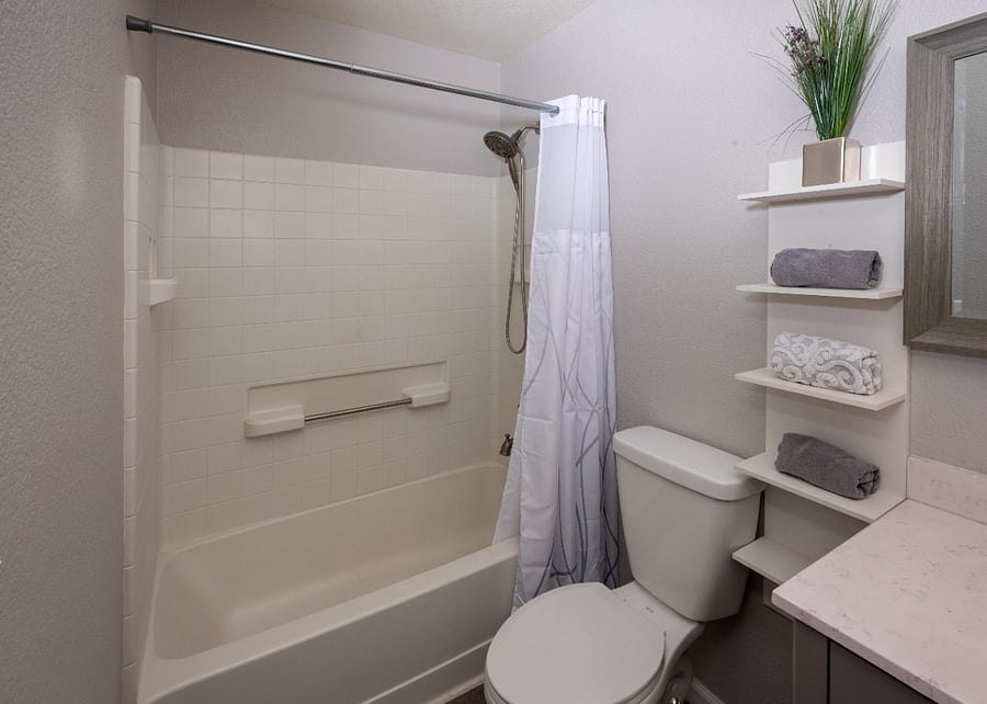 Upstairs secondary bathroom. Full tub and shower.