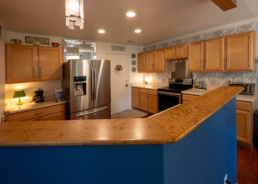 Kitchen, *note: a new microwave will be installed over the cooktop - A generous walk in pantry is to the far left of the refrigerator (couldn't get photo)