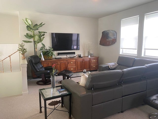 Media room for relaxing.  There is an adjacent office area in the loft as well.
