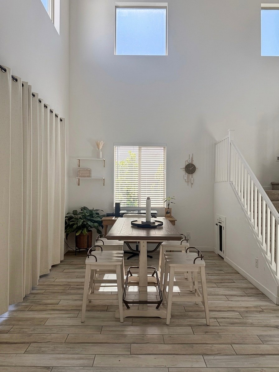 A versatile workspace and dining area that seamlessly transitions from your productive daytime setup to additional seating for dinner guests.