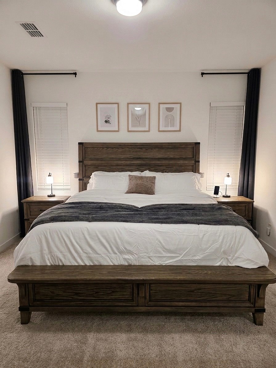 The ultimate master retreat featuring a cozy king bed, blackout curtains, and a 65-inch TV, complete with a spacious walk-in closet and a beautiful en-suite bathroom.