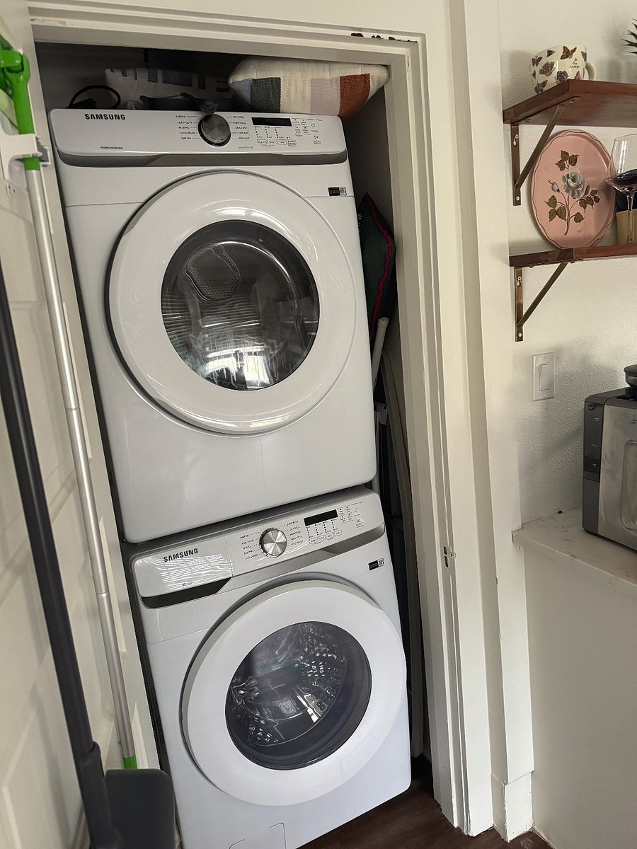 Full size in unit washer and dryer. Both units are just a few years old. Included in closet inside the kitchen.