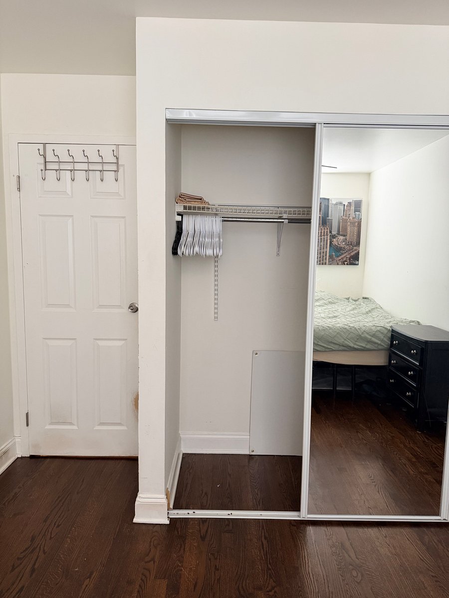 Bedroom closet with full size mirror
