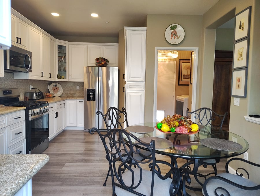 Gourmet Kitchen,  cooking equipment, adjoining laundry. 
