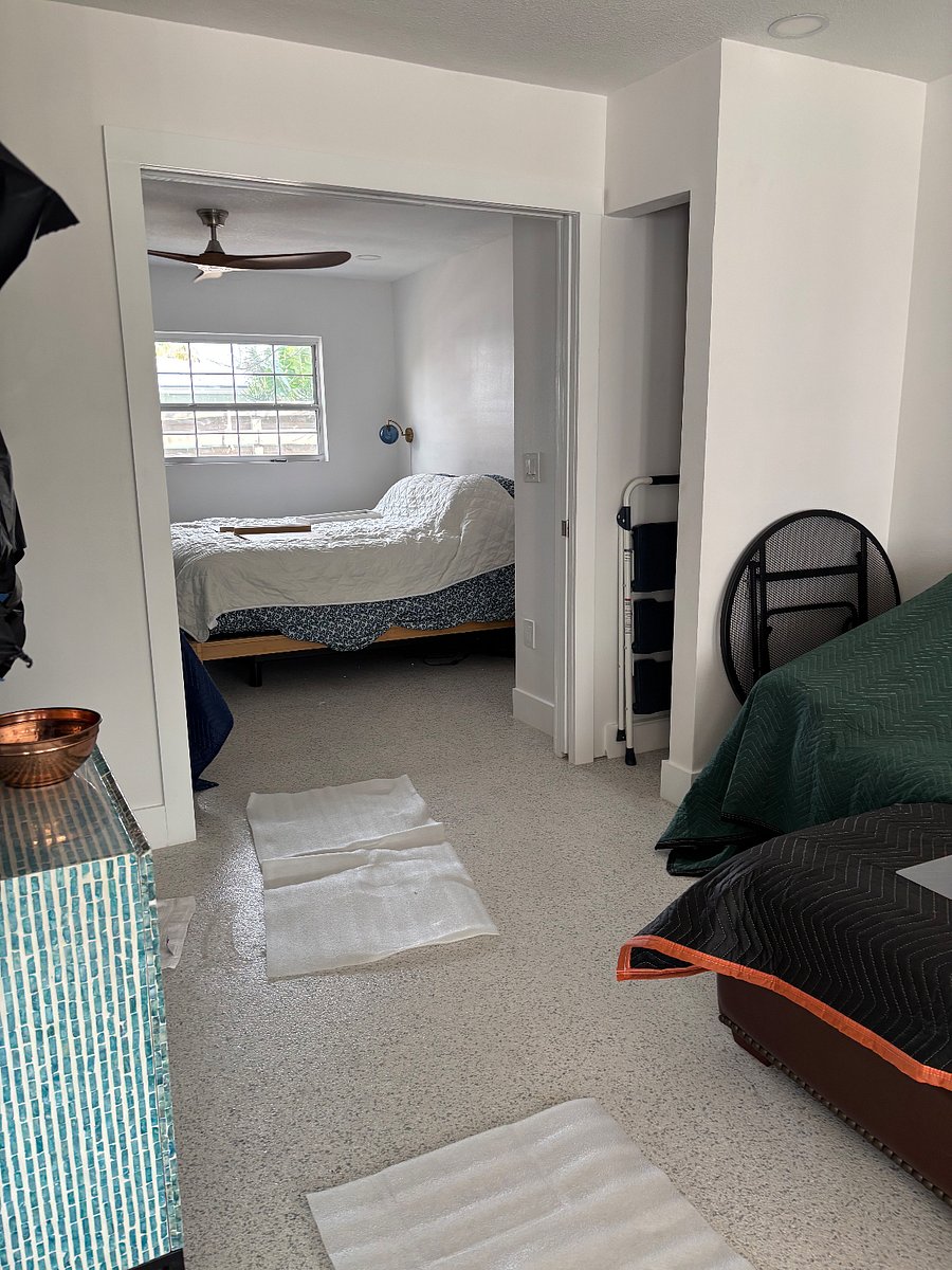 Bedroom with double pocket doors. Bedroom w/adjustable bed, storage closet