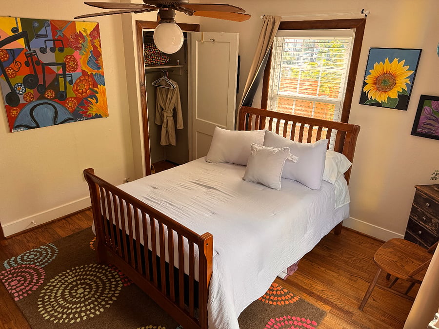 Small rear bedroom closet. 
Bathrobes are available for your and your guests comfort 