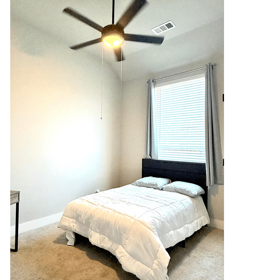 Whether you're catching up on a few emails, joining a virtual meeting, or simply enjoying a quiet moment to yourself, this thoughtfully designed bedroom offers the perfect balance of productivity and relaxation.