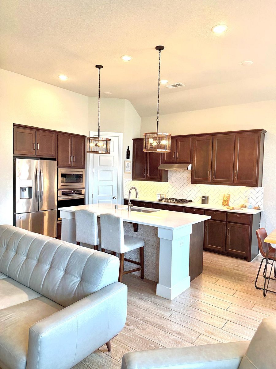 Whether you're preparing a quick breakfast or gathering for a homemade dinner, this open kitchen keeps everyone connected so no one misses a moment of the conversation.