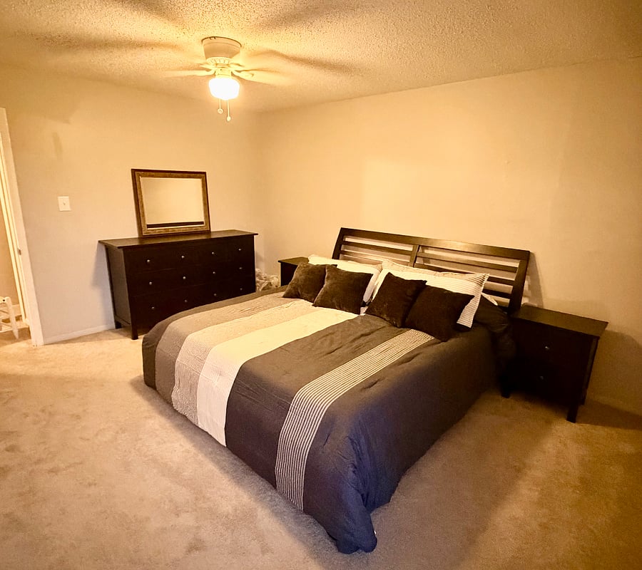 Bedroom #1 w/ king bed, view from corner window
