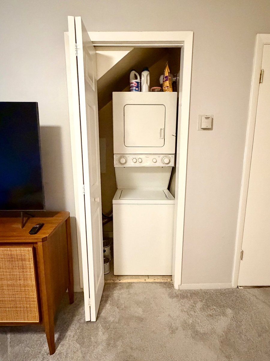Stacked washer/dryer located downstairs