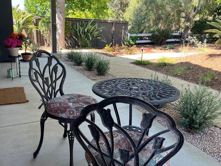 Covered porch seating area.