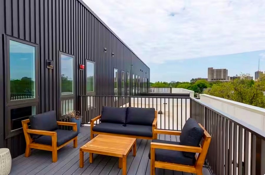 Comfortable rooftop seating perfect for morning coffee or evening unwinding.