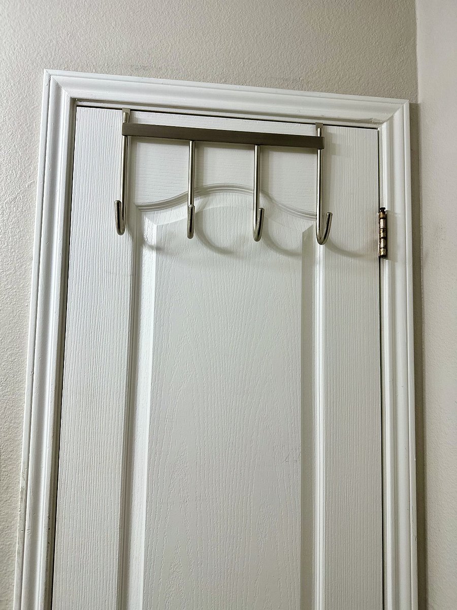 Private bathroom door hangers