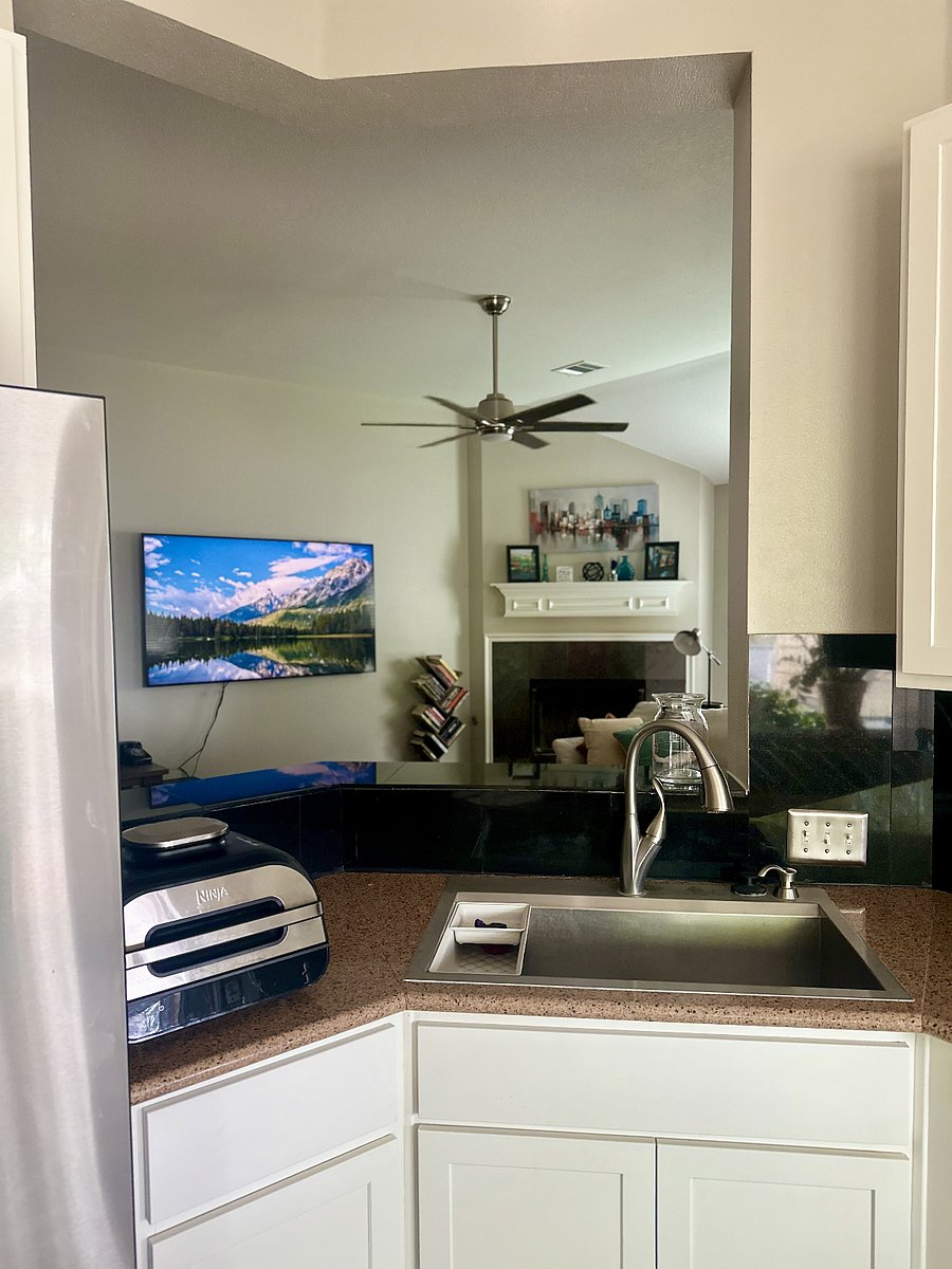 View from the Kitchen into the Living Room.