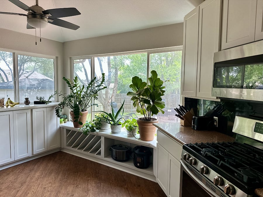 Kitchen with large windows! We love it, and we think you will, too!