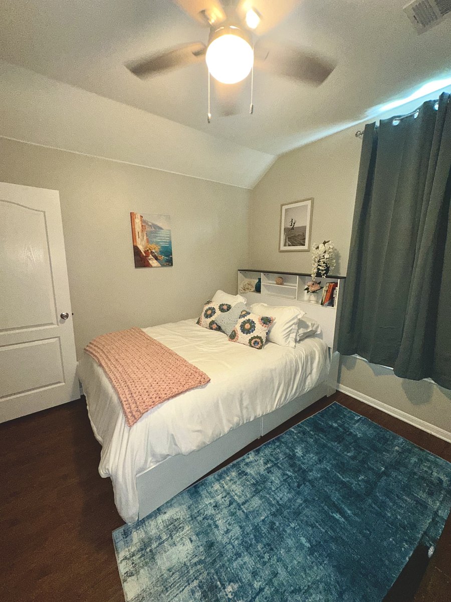 Bedroom with handcrafted throw pillows and blanket that are super soft!
