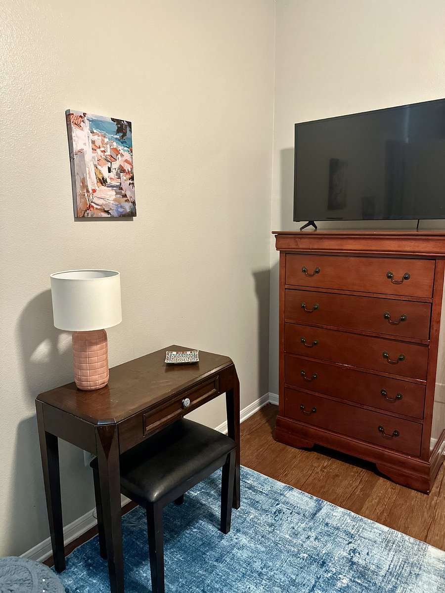 Desk and chest of drawers in the bedroom.
