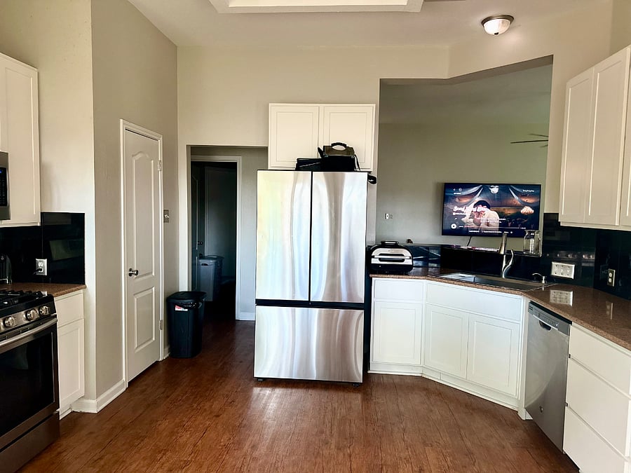 Kitchen Refrigerator, Sink, and Dishwasher View
