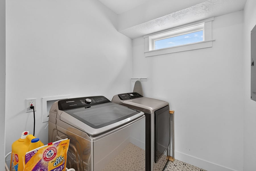 Laundry room (on upper level next to master suite)