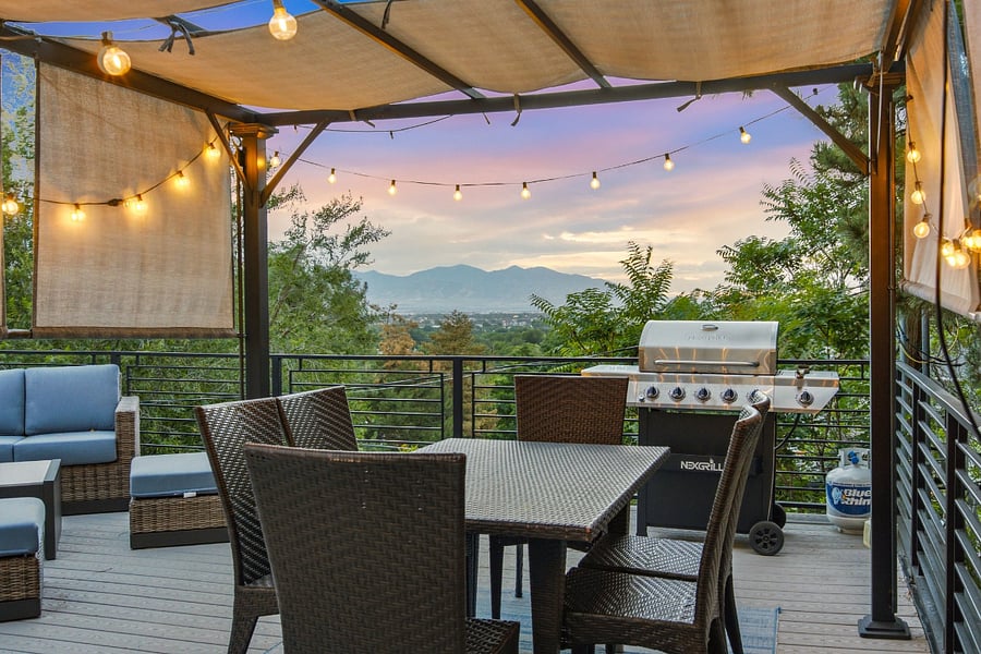 Back deck pergola-covered dining area