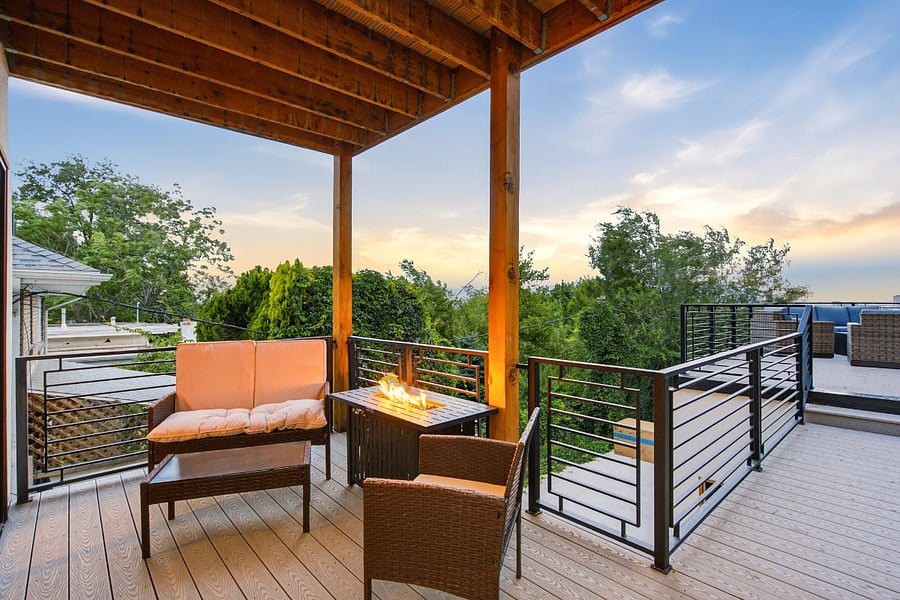 Small back deck seating area with fire pit