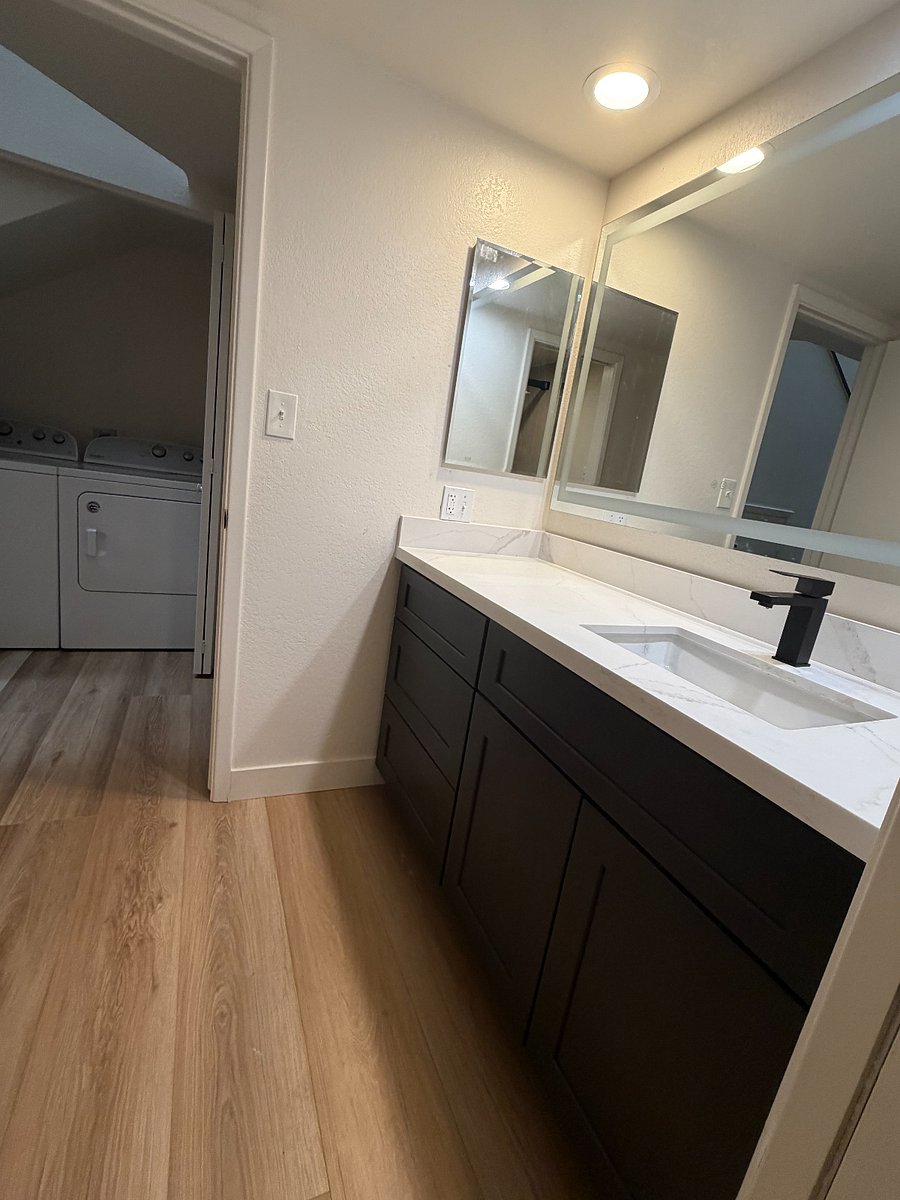 Downstairs Bathroom/Laundry in Hall