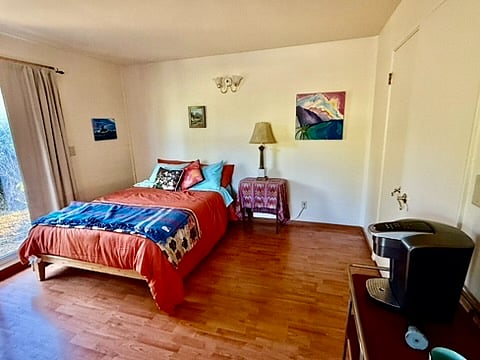 Bedroom with new full Nectar bed, sheets and quilt. Keurig on the right. There will be a comfortable chair in right hand corner,,,still looking.