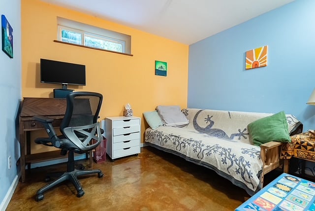 designated workspace with desk and futon