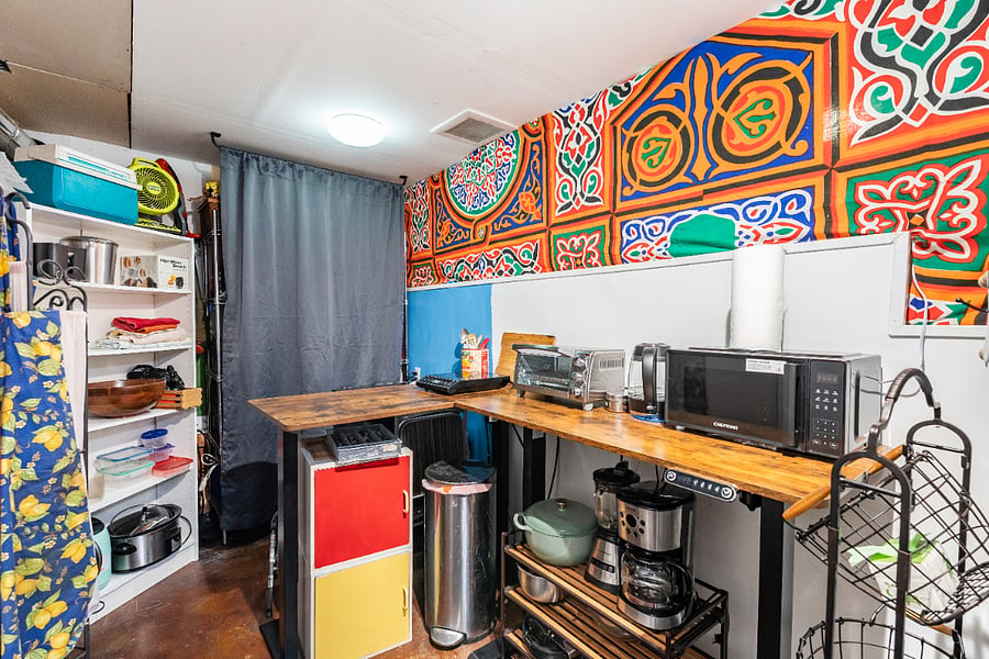 kitchenette furnished with microwave, electric burner, electric kettle, toaster oven, coffee maker and more