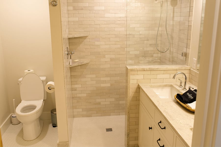 large bathroom with tile shower