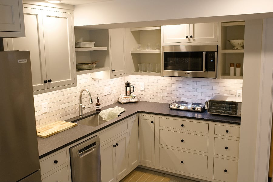 New kitchen with custom cabinets, new appliances and kitchen essentials.