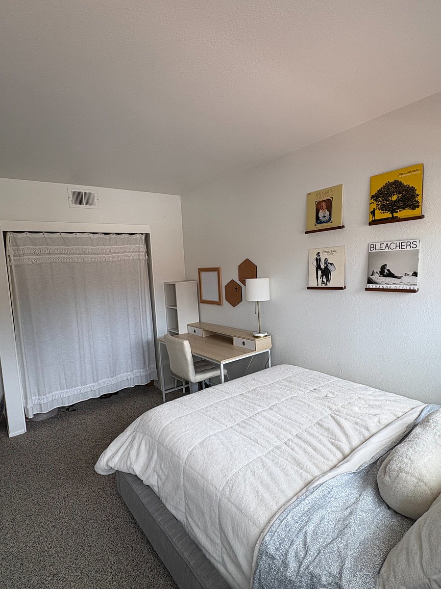 Desk and closet space in double bedroom